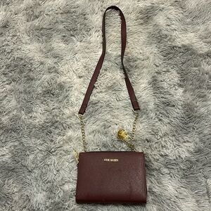maroon cross body bag